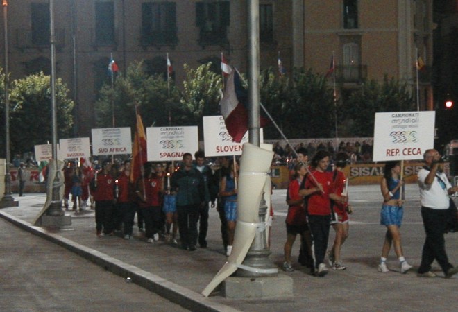 A parade of nations entering the arena. 