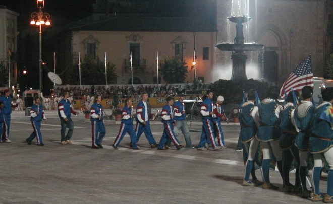 Team USA passing the fountain in Piazza Garibaldi.