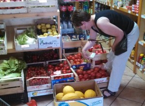 Tomato shopping in an Italian grocery store.